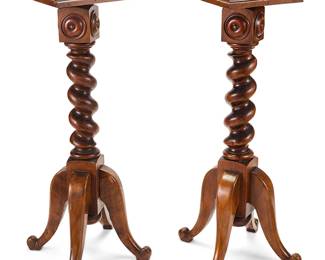 1071
Late 20th century
A Pair Of Baroque-Style Turned Wood Plant Stands
Each stand with a square beveled top centering a spiral column set upon four curved legs, 2 pieces
Each: 40.75" H x 15" W x 15" D approximately
Estimate: $500 - $700