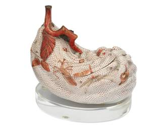 1082
Meiji period 1868-1912 or later
A Japanese Meiji Kutani Porcelain Lidded Tureen
Marked with Japanese characters in red enamel to the underside reading: Kutani Zo
The Buddha's Hand citron-shaped lidded dish with various insect and animal motifs rendered in polychrome enamel and gilt accents surmounted by a three-dimensional handle in the shape of a gnarled branch stem
6" H x 5" W x 7" D
Estimate: $500 - $700