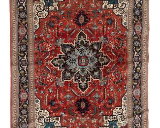 1087
Late 20th century
A Tabriz Area Rug
The wool-on-cotton rug featuring a blue border and medallion with geometric motifs on a red ground
9' 6" L x 6' 6" W
Estimate: $1,000 - $1,500