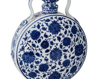 1111
20th century
A Chinese Blue And White Porcelain Moon Flask
Marked to the underside in blue underglaze bearing an apocryphal reign mark for Qianlong Period (1736-1795)
The flattened form ceramic vessel decorated with all-over blue underglaze vine and lotus scroll motifs on a white glazed ground
13.5" H x 10" W x 4" D
Estimate: $500 - $700