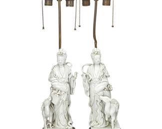1120
Late Qing Dynasty 1644-1911 or later
A Pair Of Chinese Dehua Figural Porcelain Table Lamps
One figure stamped on the verso with a seal reading: Xu Yunlin zhi
Two glossy white porcelain He Xiangu figures, each adorned with flowers and astride a deer, now mounted on a carved wood and brass square plinth base, retrofitted as lamps, each lacking a shade, electrified, 2 pieces
Each: 29" H x 7.5" W x 6" D
Estimate: $1,000 - $1,500