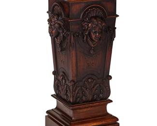 1126
Late 19th century
A Victorian Renaissance Revival Wood Pedestal
The carved wood pedestal, three sides featuring female figural masks in high relief with rocaille, scrolled leaf, and swagged fabric highlights
39.325" H x 18.25" W x 18.25" D
Estimate: $800 - $1,200