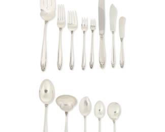 1165
Early/mid-20th century
An International Sterling "Prelude" Flatware Service
Each marked for International Sterling "Prelude" pattern
Designed 1939, comprising 8 place knives (8.75" L), 10 butter spreaders (5.75" L), 1 master butter spreader (7.125" L), 8 place forks (7.25" L), 8 salad forks (6.5" L), 8 cocktail forks (5.5" L), 1 pickle/olive fork (5.75" L), 1 cold meat serving fork (8.875" L), 8 tea spoons (6" L), 1 sugar spoon (5.875" L), 1 citrus spoon (6.325" L), 2 serving/table spoons (8.5" L), 1 gravy ladle (6.625" L), and 1 pie server (10.125" L), 59 pieces total
Weighable sterling: 56.815 oz. troy approximately
Estimate: $1,200 - $1,800