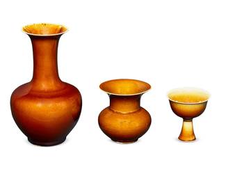 1178
20th century
A Group Of Chinese Brown Glazed Porcelain Vessels
One cup marked to the underside in blue underglaze bearing a reign mark for Wanli Period (1573-1620) of the Ming Dynasty (1368-1644); one marked bearing an apocryphal reign mark for Jaijing Period (1522-1566); one marked bearing an apocryphal reign mark for Tianqi Period (1621-1627)
Three porcelain vessels ach with an all-over coppery brown glaze comprising a stick neck vase, a zhadou (leys jar) and a footed cup, 3 pieces
Largest: 9.75" H x 5.25" Dia.; smallest: 4" H x 3.75" Dia.
Estimate: $500 - $700