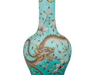 1181
Late Qing Dynasty 1644-1911 or later
A Chinese Turquoise Enameled Porcelain Vase
Marked to the underside in red enamel bearing the reign mark for Guangxu Period (1875-1908)
With all-over decoration depicting a five clawed dragon writhing amid floral branches in grisaille enamels upon a turquoise enameled ground between bands of yellow encircling the rim and foot
17.5" H x 7.5" Dia.
Estimate: $500 - $700