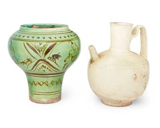 1192
Song Dynasty 960-1279 or later
Two Chinese Earthenware Vessels
Comprising a straw glazed ceramic vessel with handle and spout and a green glazed Cizhou-style ceramic vessel with slip glaze figural and foliate decoration, 2 pieces
Larger: 8" H x 7" Dia.; smaller: 8.5" H x 6" Dia.
Estimate: $600 - $800