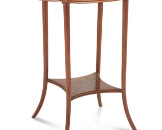 1202
Émile Gallé (1846-1904)
A two-tiered marquetry occasional table, circa 1885-1904; Nancy, France
Signed in marquetry: Gallé
The two-tiered table with lobed, rectangular top with floral marquetry over a narrowing and shaped undershelf, raised overall on four splayed feet
28.5" H x 25" W x 18" D
Estimate: $800 - $1,200