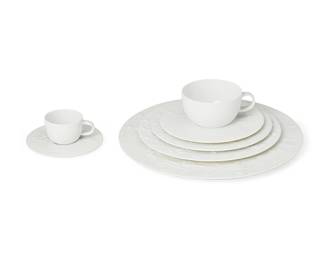 1218
Late 20th century
A Bjorn Wiinblad For Rosenthal "Zauberflöte" Porcelain Dinner Service
Each marked: Rosenthal / Germany; flat items signed: Die Zauberflöte / Bjorn Wiinblad; further marked in gilt to the underside in the artist's hand with various excerpts from the play
The bisque porcelain service with low relief decorations depicting the story of The Magic Flute, comprising 12 dinner plates (11.25" Dia.), 8 salad plates (8.75" Dia.), 12 bread and butter plates (7.325" Dia.), 12 flat cups (3.625" Dia.) with 4 saucers (6.325" Dia.), and 12 demitasse cups (2.325" Dia.) with 13 saucers (4.75" Dia.), 73 pieces
Estimate: $800 - $1,200