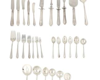 1219
Mid/late 20th century
A Towle "Lady Diana" Sterling Silver Flatware Service
Each marked for Towle and sterling
Comprising 12 dinner knives (9.625"), 12 lunch knives (8.75"), 12 fish knives (6.75"), 12 butter spreaders (5.875"), 1 master butter knife (7"), 12 dinner forks (7.75"), 12 lunch forks (7.25"), 12 salad forks (6.75"),12 dessert forks (6.325"), 12 cocktail forks (5.625"), 12 cream soup spoons (6.25"), 12 bullion soup spoons (5"), 12 sorbet spoons (5.75"), 24 tea spoons (6"), 12 five o'clock tea spoons (5.75"), 1 sugar spoon (5.625"), 4 table/serving spoons (8.25"), 1 cold meat serving fork (7.75"), 1 jelly server (6.625"), 1 gravy ladle (6.75"), 3 cream ladles (5.5"), 1 pickle fork (6"), 1 olive fork (6") 1 pierced olive spoon (6"),1 bonbon spoon (4.75"), 1 tomato server (7.325"), 1 pie server (10.125"), 1 large steak carving set (11.25" and 9.625"), and 1 small steak carving set (10" and 8.875"), sold together with a blue felt-lined hinged wood storage box with upper tray