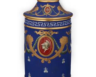 1244
Mid-20th century; Paris, France
An Atelier Le Tallec French Empire-Style Porcelain Apothecary Jar
Marked to the underside: Hand painted by Le Tallec / Paris / Made in France
The lidded, cylindrical jar with hand painted polychrome Neoclassical motifs and gilt accents on a matte cobalt blue ground
12.25" H x 5.5" Dia.
Estimate: $1,000 - $1,500