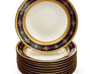 1245
Late 19th/early 20th century; Limoges, France
A Group Of Limoges C. Ahrenfeldt Porcelain Soup Bowls
Each marked: France [Charles Ahrenfeldt] Depose; each further marked for retailer: Orvington Bros. / New York / Fabrique a Limoges
Manufactured by Ahrenfeldt porcelain factory (est. 1884), each bowl with a navy blue and gilt enameled rim, 10 pieces
Each: 1.5" H x 8.75" Dia.
Estimate: $500 - $700