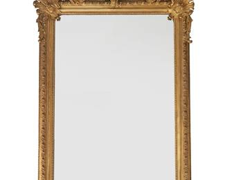 1251
20th century
A Large Baroque-Style Carved And Giltwood Mirror
Appears unmarked
The carved and giltwood rectangular frame with egg-and-dart motifs, surmounted by scrollwork and acanthus leaf cornice
96" H x 60" W x 8.5" D
Estimate: $1,500 - $2,500