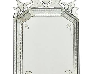 1256
Mid/late 20th Century
A Venetian Wall Mirror
The Italian multi-panel mirror in octagonal form with mounted floral accents, surmounted by a scrolled foliate pediment
48" H x 31" W x 4.75" D
Estimate: $600 - $800