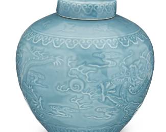 1263
20th century
A Chinese Lidded Porcelain Jar
Marked to the underside in blue underglaze bearing an apocryphal reign mark for Daoguang Period (1821-1850)
With continuous molded dragon and cloud motifs and an all-over pale teal glaze
7.5" H x 7" Dia.
Estimate: $500 - $800