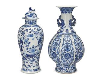 1264
20th century
Two Chinese Blue And White Porcelain Vases
Vase marked to the underside in blue underglaze bearing an apocryphal reign mark for Yongzheng Period (1723-1735); lidded vase marked to the underside in blue underglaze bearing an apocryphal reign mark for Kangxi Period (1662-1722)
Two ceramic vases decorated with blue underglaze on a white ground comprising one ceramic vase with ribbed bulbous body, opposing applied handles, and flared rim with all-over foliate and scroll motifs and one lidded vase decorated with a continuous figural scene and guardian lion finial, 2 pieces
Larger: 15.5" H x 8" Dia.; smaller: 15" H x 5.5" Dia.
Estimate: $700 - $900