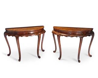 1268
19th century
A Pair Of Chinese Demilune Tables
The wood console tables in the manner of Queen Anne style, featuring mortise and tenon joints and a carved apron decorated with a yin and yang symbol, supported on four curvilinear legs with scroll feet, 2 pieces
Each: 32.5" H x 46" W x 23.25" D approximately
Estimate: $1,000 - $1,500