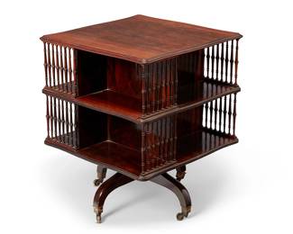 1271
Late 19th/early 20th century
A Howard And Sons Mahogany Revolving Bookcase
Marked on a metal tag: Howard & Sons / Manufacturers / 25, 26, 27 Berners St / London, W.
The George III-style bookcase with two stacked divisions and turned wood spindles on each side, set on a quadruped base with brass casters
29.125" H x 23.5" W x 23.5" D
Estimate: $600 - $800