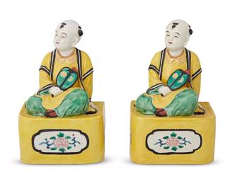 1295
20th century
A Pair Of Chinese Export Enameled Porcelain Figures
Each appears unmarked
Two polychrome enameled ceramic figures, each depicting a young man with a fan seated upon a raised platform with floral medallions, 2 pieces
Each: 8.25" H x 5.5" W x 4" D
Estimate: $1,000 - $2,000