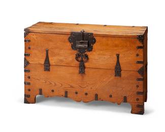 1301
Early/mid-20th century
An East Asian Blanket Chest
The likely zelkova wood chest with black iron hardware and lock latching a drop-down door, revealing three small upper drawers above an open cavity, set upon carved wood legs
26" H x 40.75" W x 17" D
Estimate: $500 - $700