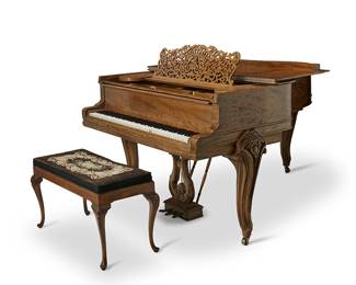 1305
Circa 1896
A Steinway Grand Piano
Marked: Steinway & Sons / serial no. 86648; further marked to interior for various patents
With a mahogany case, set upon scrollwork carved legs; along with a later added bench with a needlepoint upholstered cushion, 2 pieces
Piano: 39" H x 56" W x 75" D; bench: 20" H x 36" W x 15" D
Estimate: $4,000 - $6,000