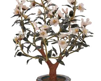 1315
Mid/late 20th century
A Chinese Carved Stone Tree
Unmarked
The tree decorated with carved quartz and rose quartz peony flowers and possibly nephrite leaves, affixed to woven fabric-encased and pliable "branches," stemming from a painted plaster trunk, set in a weighted brass and enamel cloisonné pot with foliate motif on a blue ground
22.75" H x 16" W x 14.5" D approx., dimensions variable
Estimate: $500 - $700