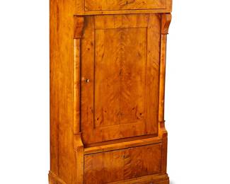 1338
Late 19th/Early 20th century
A Biedermeier-Style Burl Maple Cabinet
Appears unmarked
The burlwood cabinet with a single drawer over a central locking door, opening to reveal interior shelving, above another larger drawer, on four bracket feet
58" H x 31" W x 18.5" D
Estimate: $600 - $900