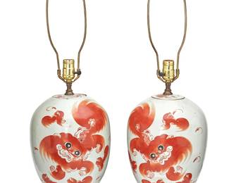 1356
Late Qing Period 1644-1911 or later
A Pair Of Chinese Gianjiangcai Porcelain Lamps
One marked to the body with Chinese characters for the potter: [given name] Gu
Each lidded jar decorated with guardian lions rendered in red enamel and a lengthy colophon in black enamel on a white ground and retrofitted as a table lamp and mounted on a carved wood base, electrified
Each: 25.75" H x 8" Dia.
Estimate: $400 - $600