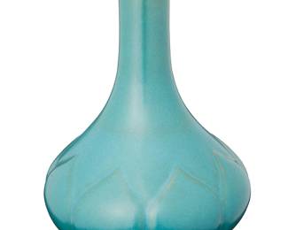 1357
20th century
A Chinese Blue Glazed Porcelain Vase
Embossed to the underside bearing an apocryphal reign mark for Qianlong Period (1736-1795)
The cerulean glazed ceramic vessel with a lobed lotus bulb body supporting a tall cylindrical neck
8.5" H x 5.25" Dia.
Estimate: $500 - $700