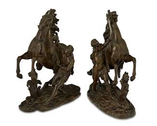 1368
Late 19th/early 20th century; France
A Pair Of Equine Bronzes After Guillaume Coustou The Elder
Each signed to the base: Coustou
Each bronze statuette in the manner of Guillame Coustou's (1677-1746) "Marly Horses," depicting a rearing horse with its groom, 2 pieces
Each: 15" H x 5" W x 13" D
Estimate: $800 - $1,200