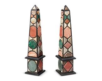 1370
Mid/late 20th century
A Pair Of Marble And Hardstone Obelisks
Each appears unmarked
The black hardstone obelisks decorated with various mounted hard and semi-precious carved and beveled stones set in alternating geometric patterns, 2 pieces
Each: 40.125" H x 9.25" W x 9.25" D
Estimate: $1,000 - $2,000