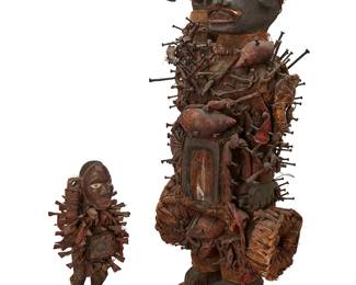 1389
Late 19th/early 20th century; Kongo Peoples, Congo, Africa
Two Carved Wood Kongo "Nkisi Nkondi" Figures
The carved and polychromed wood Congolese Power Figures, each adorned with knotted strips of fabric, and pierced allover with nails, featuring abdominal cavities housing mirror-fronted metal and resin medicine cabinets, comprising one larger Nkondi figure depicted holding a spear and additionally adorned with land snail shells, a cowrie shell, and two woven baskets; one conformingly designed smaller Nkondi figure with a fabric sack on its back and further adorned with possibly nutmeg hulls, 2 pieces
Larger: 25.75" H x 11" W x 13" D; smaller: 11.25" H x 6" W x 5.75" D
Estimate: $500 - $700