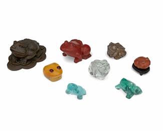 1398
20th century
A Group Of Frog Figurines
One marked for sterling
Eight frog figurines of various size and material comprising three glass frogs, one lacquered carved wood frog with a hinged lid and interior compartment, one sterling silver frog, one Lucite frog, one cast bronze Jin Chan or Golden Toad, and one carved carnelian frog with applied glass eyes, set upon carved wood stand, 8 pieces
Largest: 3.5" H x 4.5" W x 6" D; smallest: 2" H x 2.5" W x 2" D
Estimate: $400 - $600