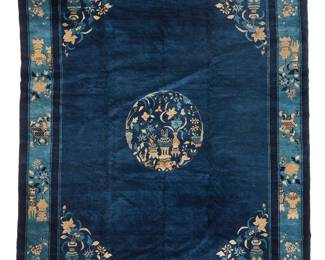 1405
20th century
A Chinese Peking-Style Rug
The washed wool on cotton foundation rug with floral arrangement motifs to each corner and repeating throughout the boarder surrounding a central medallion on a royal blue ground
9' 7" L x 8' 2" W
Estimate: $1,000 - $1,500