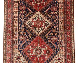 1406
Late 19th/early 20th century
A Caucasian Qashgai Rug
The wool-on-wool foundation with polychrome geometric motifs surrounding three central medallions on a royal blue ground
7' 5" L x 4' 10" W
Estimate: $2,000 - $3,000