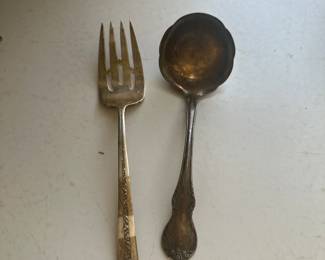 Item 105: Sterling serving spoon & serving fork $98