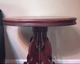 Item 6: antique (likely) mahogany accent table on castors $139