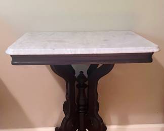 Item 16: antique mahogany & marble top table with castors $199
H 30 1/2” x W 25 1/2” x D 17 1/4”