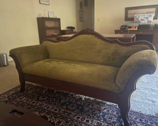 Item 21: antique velvet (moss) green & mahogany couch w/ nailhead detail $399
H 33 1/2” x W 69” x D 26”