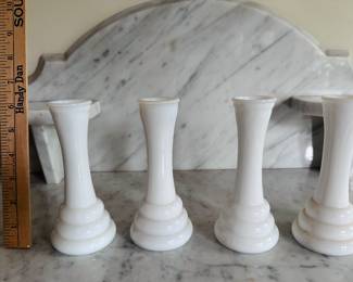 Item 73:
4 available milk glass vases $8 each or $30 for set of 4