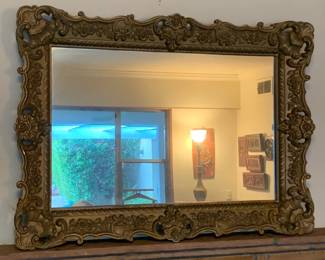 circa early 1900's mirror - highly ornated frame