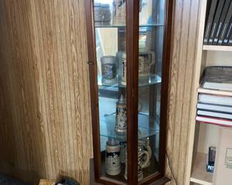 Dark Wood Lighted Display Cabinet w/Mirror back & Glass Shelfs. Collection of Vintage German Beer Steins & Mugs 