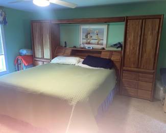 King Size Oak Bedroom set with Wood Headboard w/storage & metal bed frame. 2 Blind Front upright 3 drawer Dressers with lots of storage for clothing. King Size Bedding Blankets & Sheets. King Size Mattress w/Foundation   