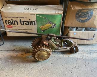 Nelson Traveling Rain Train Sprinkler & Antique Cast-Iron Rain Train Sprinkler  