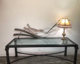 Unique Large Metal Frame GlassTop Desk
The large metal on back is Metal Wall Art it is very large .