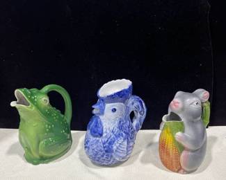 Three pitchers in an animal design