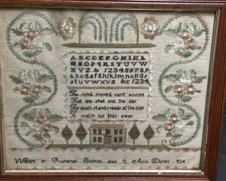Antique embroidered sampler