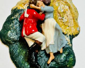 Cast iron miniature.  "A Roll in the Hay"