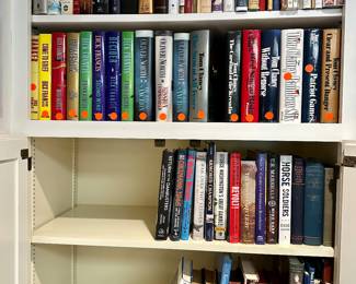 Pink dots indicate signed copies