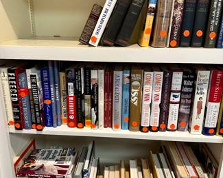 Pink dots indicate signed copies