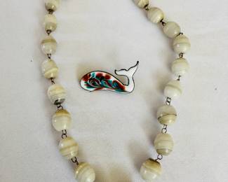 Inga Carlson brooch (center)